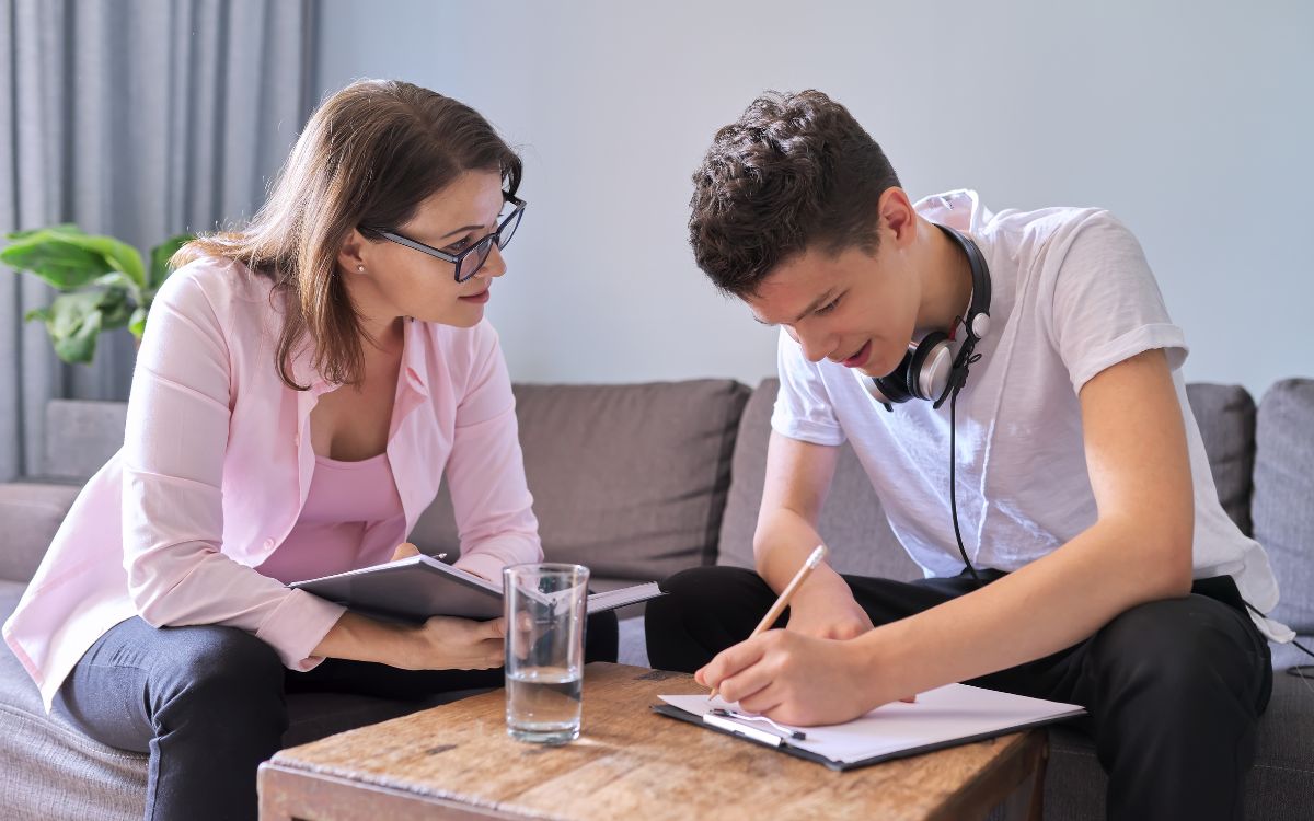 Teen talking to therapist in a session